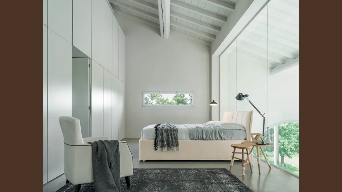 Letto matrimoniale con testiera trapuntata e box contenitore Giada di Rigosalotti