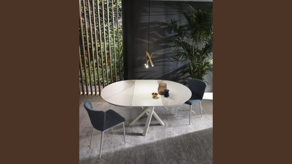 Tavolo allungabile Shangai Round con top in ceramica e base in alluminio verniciato di Riflessi