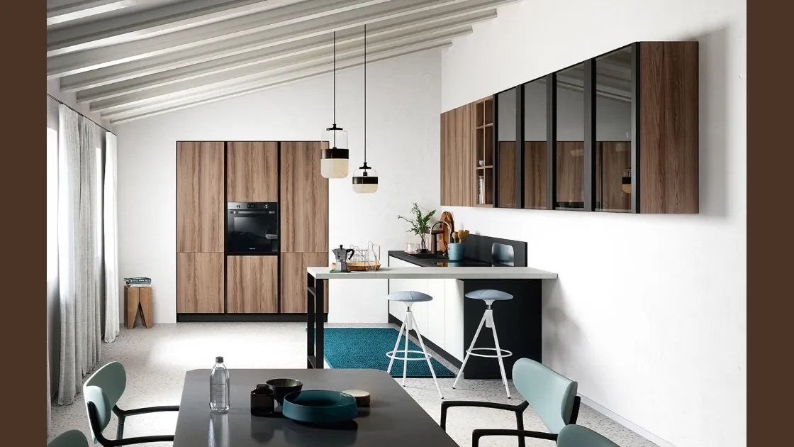 Cucina Moderna con penisola Colibrì Presa in finitura bianco luce e noce nordico di Forma la cucina
